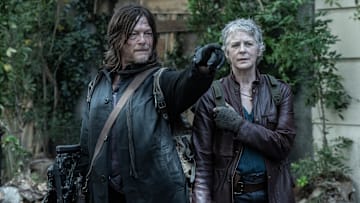 Norman Reedus as Daryl Dixon, Melissa McBride as Carol Peletier - The Walking Dead: Daryl Dixon _ Season 3 - Photo Credit: Manuel Fernandez-Valdes/AMC