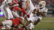 Sep 7, 2024; Columbus, Ohio, USA;  Western Michigan Broncos running back Jaden Nixon (3) is tackled by Ohio State Buckeyes cornerback Lorenzo Styles Jr. (3) on a kickoff return during the first half at Ohio Stadium. Mandatory Credit: Adam Cairns-Imagn Images