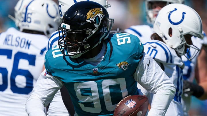 Jacksonville Jaguars defensive end Angelo Blackson (90) comes up with a fumble recovering during game action at EverBank Stadium on Sunday, Oct 15, 2023, in Jacksonville.