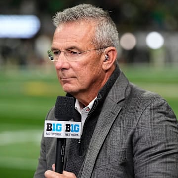Former Ohio State Buckeyes head coach Urban Meyer broadcasts for the Big Ten Network prior to the College Football Playoff National Championship against the Notre Dame Fighting Irish at Mercedes-Benz Stadium in Atlanta on Jan. 20, 2025.