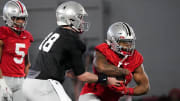 Mar 5, 2024; Columbus, OH, USA; Ohio State Buckeyes quarterback Will Howard (18) hands off to