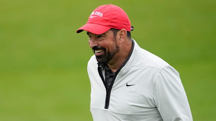 Ohio State football head coach Ryan Day reacts after his putt on 18 during the Workday Golden Bear Pro-Am at Muirfield Village Golf Club in Dublin, Ohio, on May 28, 2025.