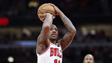 Feb 3, 2024; Chicago, Illinois, USA; Chicago Bulls forward DeMar DeRozan (11) shoots a free throw against the Sacramento Kings during the first half at United Center. Mandatory Credit: Kamil Krzaczynski-Imagn Images