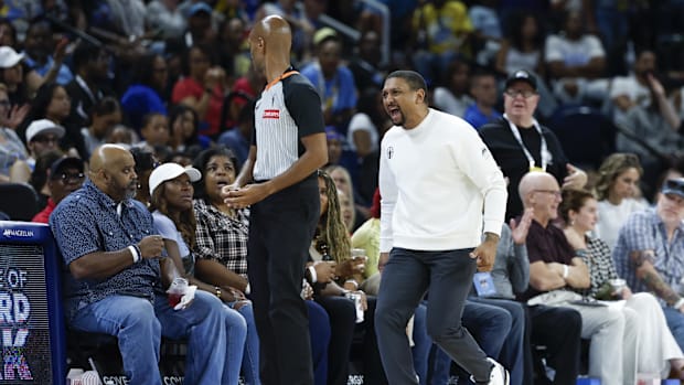 Chicago Sky coach Tyler Marsh and a WNBA ref