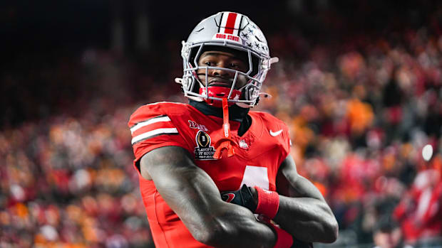 Ohio State Buckeyes wide receiver Jeremiah Smith (4) celebrates after scoring a touchdown against Tennessee Volunteers 