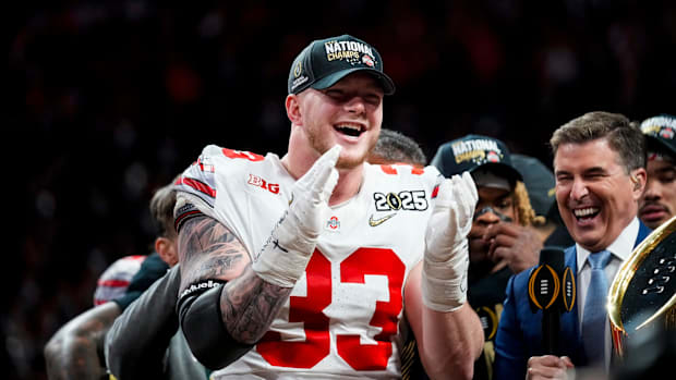 Jack Sawyer celebrates after defeating Notre Dame Fighting Irish in the College Football Playoff. 