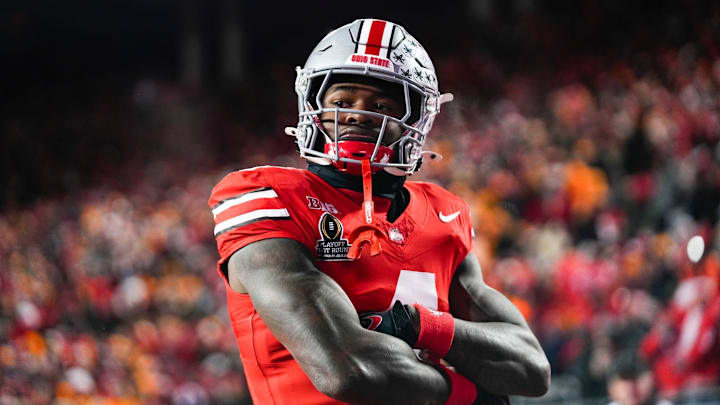 Ohio State freshman Jeremiah Smith reacts after scoring a touchdown. Ohio State freshman Jeremiah Smith reacts after scoring a touchdown.
