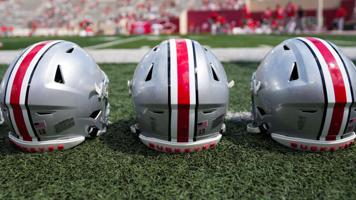 Sep 2, 2023; Bloomington, Indiana, USA; Ohio State Buckeyes helmets sit on the sideline prior to the NCAA football game at Indiana University Memorial Stadium.