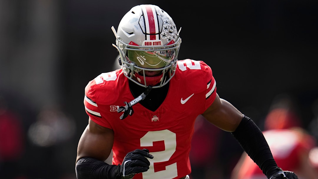 Ohio State Buckeyes defensive back Caleb Downs warms up during the NCAA football game against the Penn State Nittany Lions at Ohio Stadium