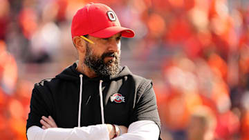 Ohio State Buckeyes defensive coordinator Matt Patricia watches warm ups prior to the NCAA football game against the Illinois Fighting Illini at Gies Memorial Stadium in Champaign on Oct. 11, 2025.