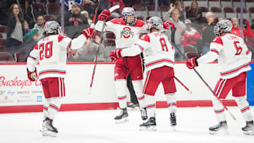 Oct 7, 2022; Columbus, Ohio, USA;  Teammates celebrate a goal by Ohio State Buckeyes forward Stephen Halliday (19) during the NCAA men's hockey game against the Wisconsin Badgers at the Schottenstein Center. Mandatory Credit: Adam Cairns-The Columbus Dispatch

Ncaa Hockey Wisconsin Vs Ohio State