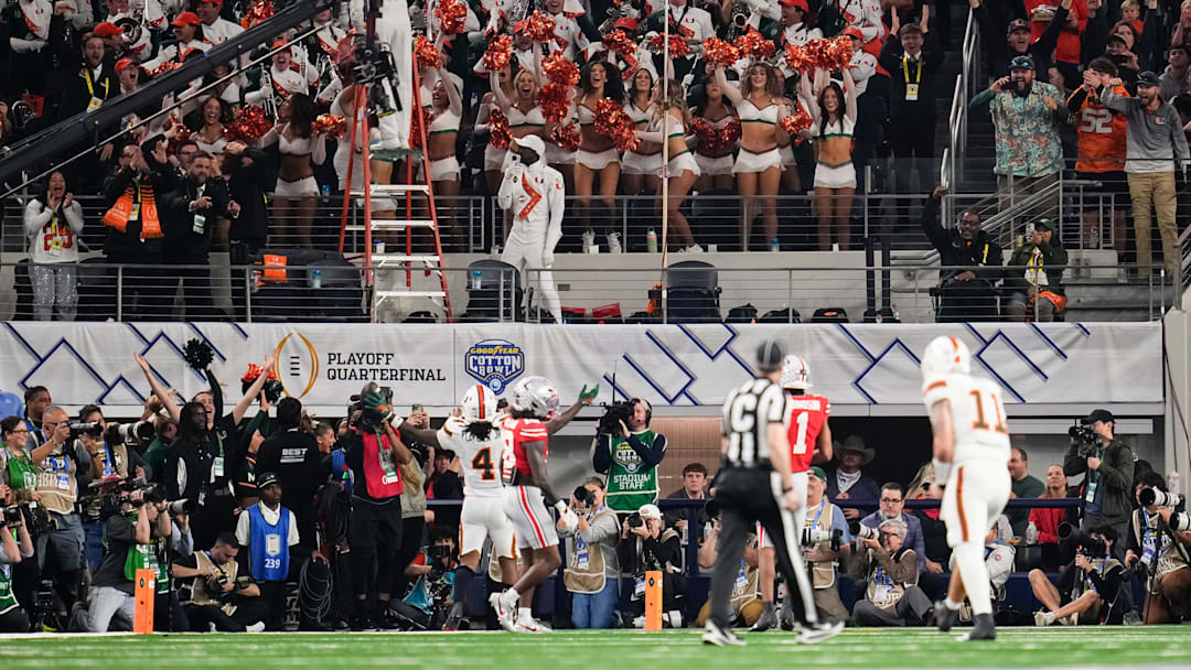 Miami Hurricanes running back Mark Fletcher Jr. (4) scores a touchdown during the Cotton Bowl at AT&T Stadium in Arlington, Texas for the College Football Playoff quarterfinal game against the Ohio State Buckeyes on Dec. 31, 2025. Miami Hurricanes running back Mark Fletcher Jr. (4) scores a touchdown during the Cotton Bowl at AT&T Stadium in Arlington, Texas for the College Football Playoff quarterfinal game against the Ohio State Buckeyes on Dec. 31, 2025.