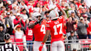 Ohio State Buckeyes wide receiver Jeremiah Smith (4) celebrates with wide receiver Carnell Tate (17) after Smith scored a touchdown in the first half at Ohio Stadium on Saturday, Nov. 9, 2024 in Columbus, Ohio.
