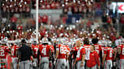 The Block O student section lights up the stadium with cell phone lights during a game against the Ohio Bobcats