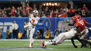 Dec 31, 2022; Atlanta, Georgia, USA; OSU Buckeyes quarterback C.J. Stroud (7) throws a pass against the Georgia Bulldogs.