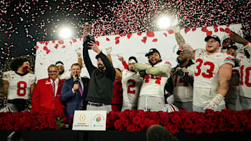 Ohio State Buckeyes head coach Ryan Day hosts the Leishman Trophy following the 41-21 win over the Oregon Ducks in the College Football Playoff quarterfinal at the Rose Bowl in Pasadena, Calif. on Jan. 1, 2025.