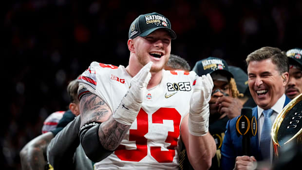 Ohio State Buckeyes defensive end Jack Sawyer (33) celebrates after defeating the Notre Dame Fighting Irish.