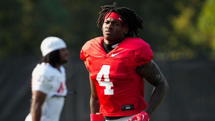 Aug 8, 2024; Columbus, Ohio, USA; Ohio State Buckeyes wide receiver Jeremiah Smith (4) runs during football practice at the Woody Hayes Athletic Complex.