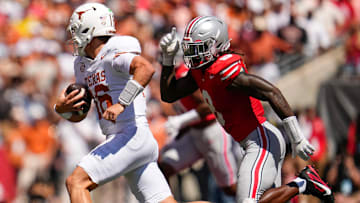 Ohio State Buckeyes linebacker Arvell Reese pursues Texas Longhorns quarterback Arch Manning.