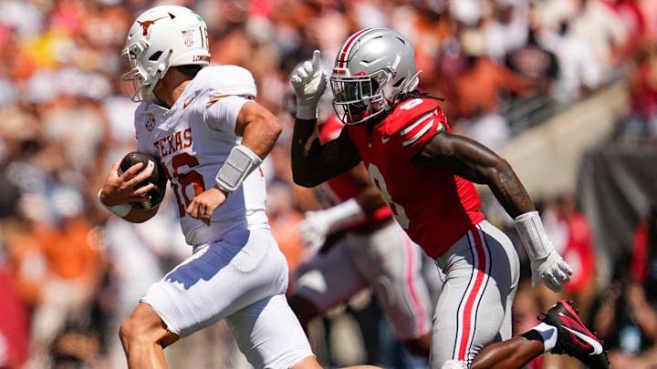 Ohio State Buckeyes linebacker Arvell Reese pursues Texas Longhorns quarterback Arch Manning. Ohio State Buckeyes linebacker Arvell Reese pursues Texas Longhorns quarterback Arch Manning.