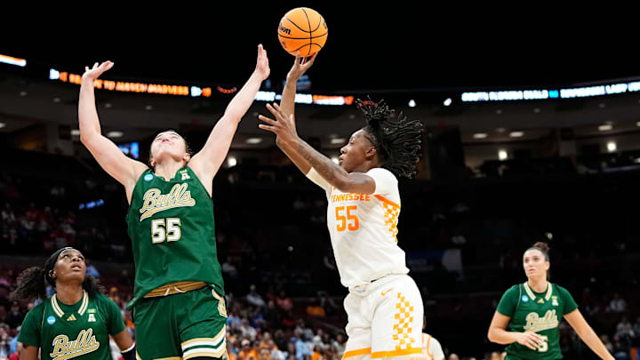 Tennessee Lady Vols guard Talaysia Cooper (55) shoots over South Florida Bulls guard Carla Brito (55) during the first round of the NCAA Women's Basketball Tournament at Value City Arena in Columbus, Ohio on March 21, 2025.