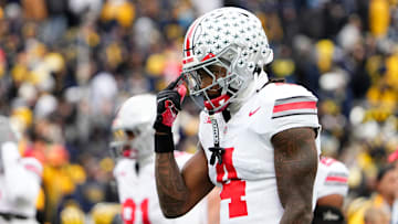 Ohio State Buckeyes wide receiver Jeremiah Smith (4) warms up prior to the NCAA football game against the Michigan Wolverines at Michigan Stadium in Ann Arbor, Mich. on Nov. 29, 2025.
