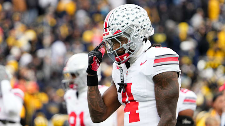 Ohio State Buckeyes wide receiver Jeremiah Smith (4) warms up prior to the NCAA football game against the Michigan Wolverines at Michigan Stadium in Ann Arbor, Mich. on Nov. 29, 2025.