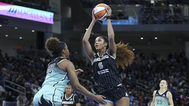 Chicago Sky forward Angel Reese drives to the basket against New York Liberty forward Kennedy Burke in a WNBA game Chicago Sky forward Angel Reese drives to the basket against New York Liberty forward Kennedy Burke in a WNBA game