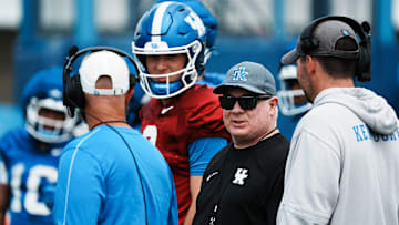 Kentucky Head Coach Mark Stoops instructs the team during practice at the Joe Craft football practice field in Lexington, Ky. on Aug. 1, 2025.