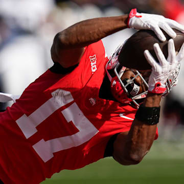 Ohio State Buckeyes wide receiver Carnell Tate (17) catches a touchdown pass during the NCAA football game against the Penn State Nittany Lions at Ohio Stadium in Columbus on Nov. 1, 2025.