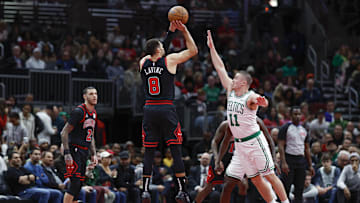 Nov 29, 2024; Chicago, Illinois, USA; Chicago Bulls guard Zach LaVine (8) shoots against Boston Celtics guard Payton Pritchard (11) 