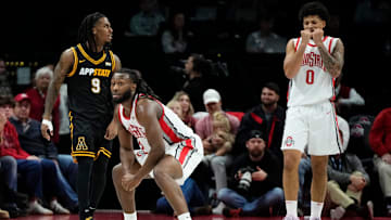Ohio State Buckeyes guard Bruce Thornton (2) and guard John Mobley Jr. (0) react beside Appalachian State Mountaineers guard Jalen Tot (9) during the NCAA men's basketball game at Value City Arena in Columbus on Nov. 11, 2025. Ohio State won 75-53.