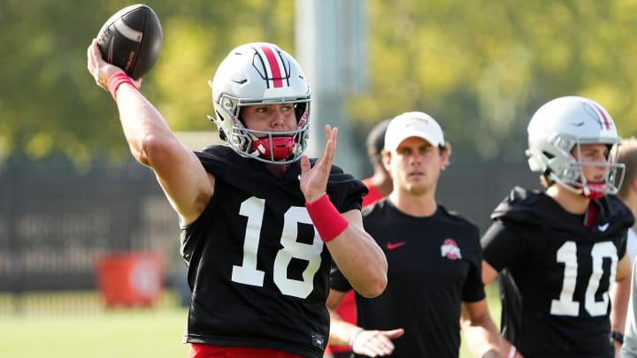 Aug 1, 2024; Columbus, OH, USA; Ohio State Buckeyes quarterback Will Howard (18) throws during football camp at the Woody Hayes Athletic Complex.