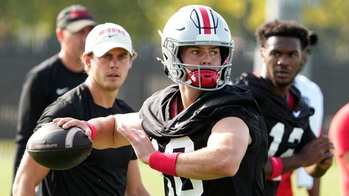 Aug 1, 2024; Columbus, OH, USA; Ohio State Buckeyes quarterback Will Howard (18) throws during football camp at the Woody Hayes Athletic Complex.