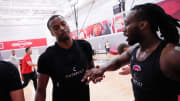 Jul 9, 2024; Columbus, OH, USA; Ohio State Buckeyes guard Micah Parrish gets a high five from guard Bruce Thornton during a summer workout in the practice gym at the Schottenstein Center.