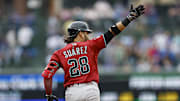 Apr 18, 2025; Chicago, Illinois, USA; Arizona Diamondbacks third baseman Eugenio Suarez (28) rounds the bases after hitting a grand slam against the Chicago Cubs during the eight inning at Wrigley Field. Mandatory Credit: Kamil Krzaczynski-Imagn Images
