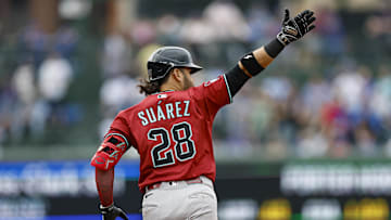 Apr 18, 2025; Chicago, Illinois, USA; Arizona Diamondbacks third baseman Eugenio Suarez (28) rounds the bases after hitting a grand slam against the Chicago Cubs during the eight inning at Wrigley Field. Mandatory Credit: Kamil Krzaczynski-Imagn Images