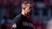 Ohio State Buckeyes offensive coordinator Brian Hartline leads warm ups prior to the NCAA football game against the Rutgers Scarlet Knights at Ohio Stadium in Columbus on Nov. 22, 2025.