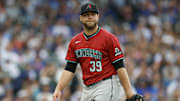 Apr 18, 2025; Chicago, Illinois, USA; Arizona Diamondbacks starting pitcher Corbin Burnes (39) reacts as he walks back to the dugout after the second inning of a baseball game against the Chicago Cubs at Wrigley Field. Mandatory Credit: Kamil Krzaczynski-Imagn Images