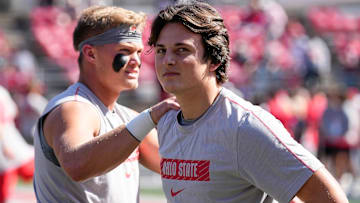 Oct 5, 2024; Columbus, OH, USA; Ohio State Buckeyes quarterback Julian Sayin and quarterback Lincoln Kienholz warm up prior to the NCAA football game against the Iowa Hawkeyes at Ohio Stadium.