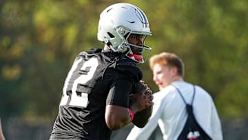 Aug 1, 2024; Columbus, OH, USA; Ohio State Buckeyes quarterback Air Noland (12) drops back to pass during football camp at the Woody Hayes Athletic Complex.