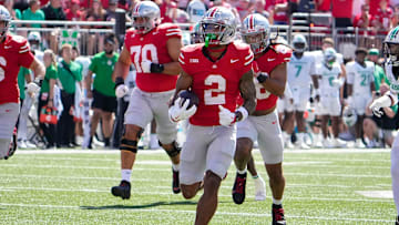 Ohio State receiver Emeka Egbuka runs for a touchdown against Marshall.