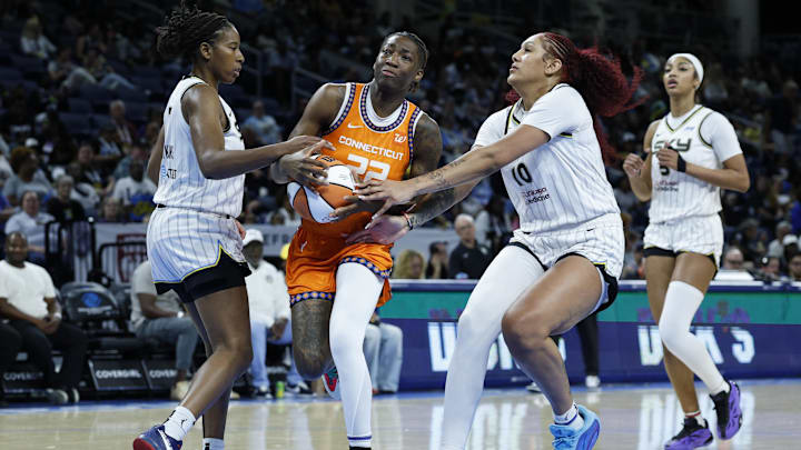 Aug 23, 2025; Chicago, Illinois, USA; Connecticut Sun guard Saniya Rivers (22) drives to the basket against the Chicago Sky during the first half at Wintrust Arena. Mandatory Credit: Kamil Krzaczynski-Imagn Images
