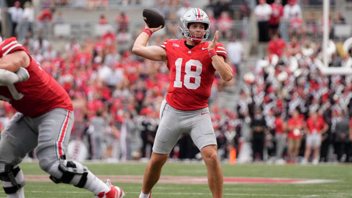 Aug 31, 2024; Columbus, OH, USA; Ohio State Buckeyes quarterback Will Howard (18) throws during the second half of the NCAA football game against the Akron Zips at Ohio Stadium. Ohio State won 52-6.