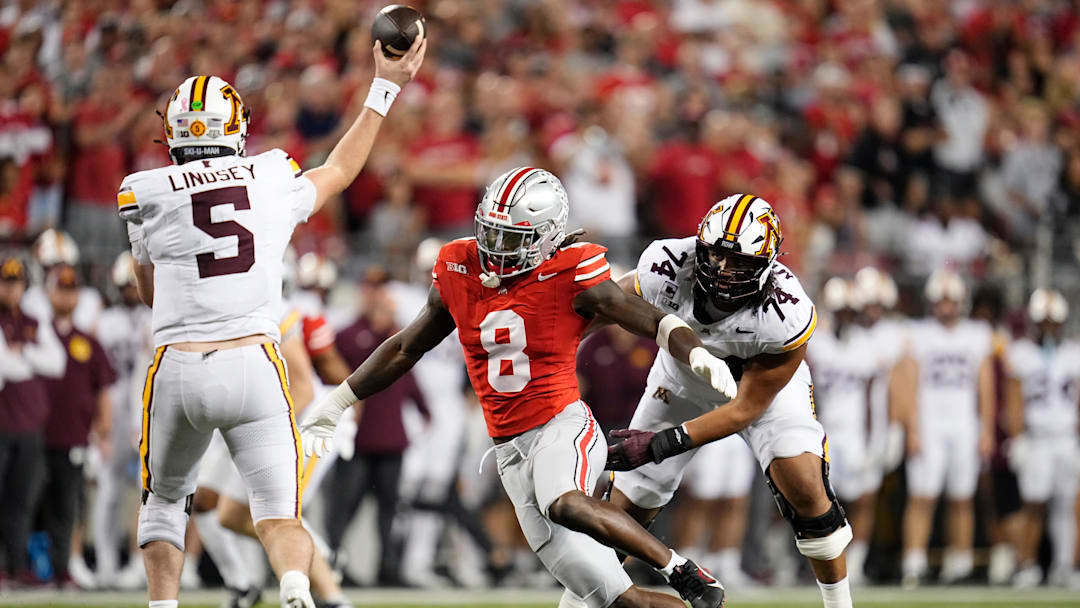 Ohio State Buckeyes linebacker Arvell Reese (8) pressures Minnesota Golden Gophers quarterback Drake Lindsey (5) during the first half of the NCAA football game at Ohio Stadium in Columbus on Oct. 4, 2025.