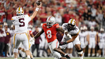 Ohio State Buckeyes linebacker Arvell Reese (8) pressures Minnesota Golden Gophers quarterback Drake Lindsey (5) during the first half of the NCAA football game at Ohio Stadium in Columbus on Oct. 4, 2025.