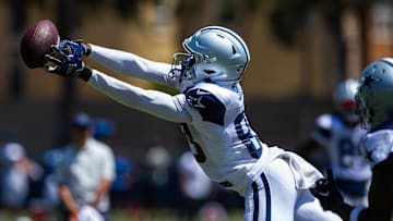 Aug 1, 2023; Oxnard, CA, USA; Dallas Cowboys wide receiver Jalen Brooks (83) reaches for the ball