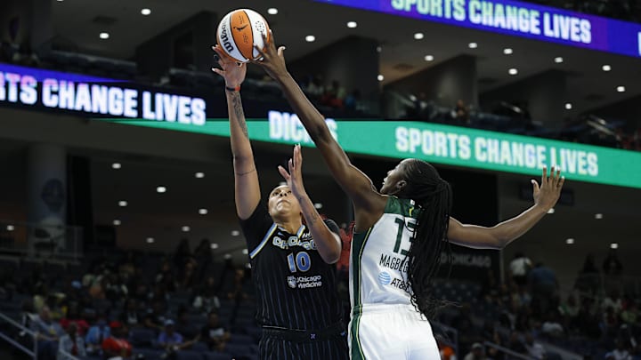 Aug 19, 2025; Chicago, Illinois, USA; Seattle Storm forward Ezi Magbegor (13) blocks Chicago Sky center Kamilla Cardoso (10) during the first half at Wintrust Arena. Mandatory Credit: Kamil Krzaczynski-Imagn Images