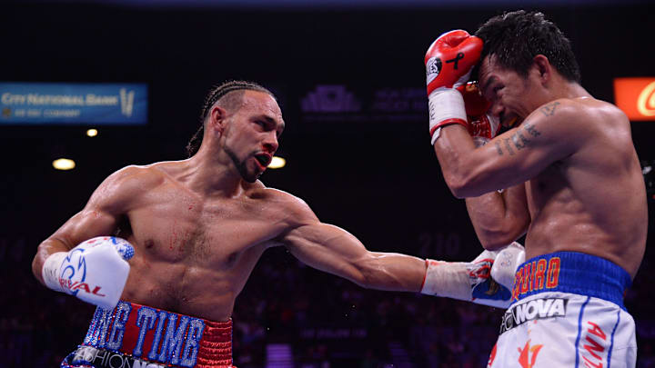 Manny Pacquiao (white trunks) and Keith Thurman (red/white/blue trunks) box during their WBA welterweight championship bout at MGM Grand Garden Arena. Pacquiao won via split decision. Manny Pacquiao (white trunks) and Keith Thurman (red/white/blue trunks) box during their WBA welterweight championship bout at MGM Grand Garden Arena. Pacquiao won via split decision.