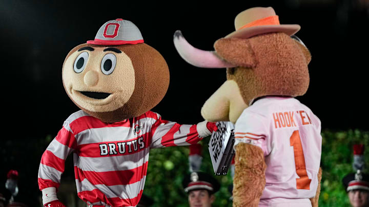 Ohio State mascot, Brutus, and University of Texas mascot, Hook 'Em, interact during a filming of the Joel Klatt Show.